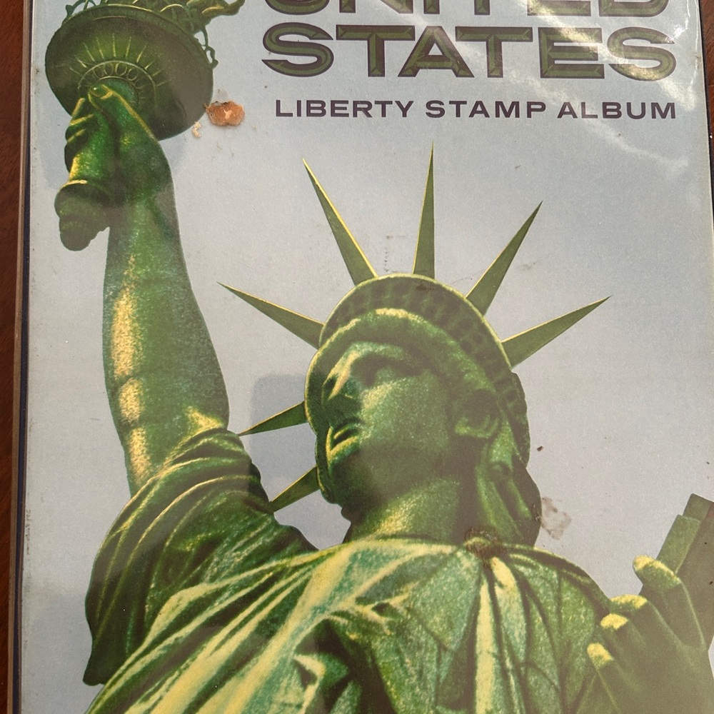 Liberty Stamp Album - copyright 1972 loaded with stamps, air mail, etc.